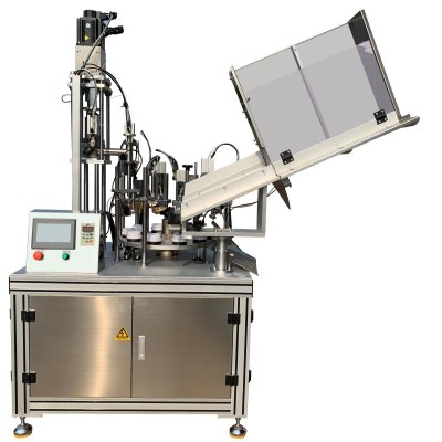 Automatic tube filling and sealing machine